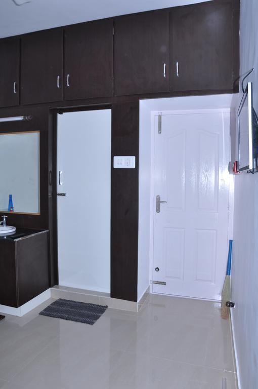 Srirangam Suit Rooms Tiruchirappalli Szoba fotó
