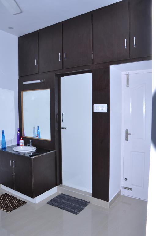 Srirangam Suit Rooms Tiruchirappalli Szoba fotó
